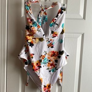 One piece. Cupshie. Medium.  New.  Tag rope is there paper tag is not